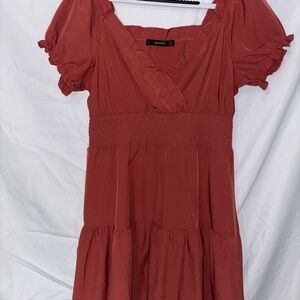 No Boundaries Ruffled Mini Dress in Rust